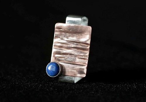 A Lapis and Copper Pendant by Elizabeth Stingl